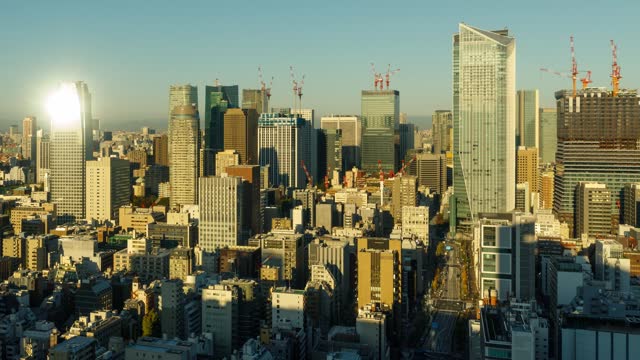 Time Lapse of the densely packed buildings of Tokyo Japan at sunrise