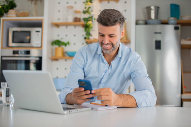 istock Mid adult man working from home 1529320486