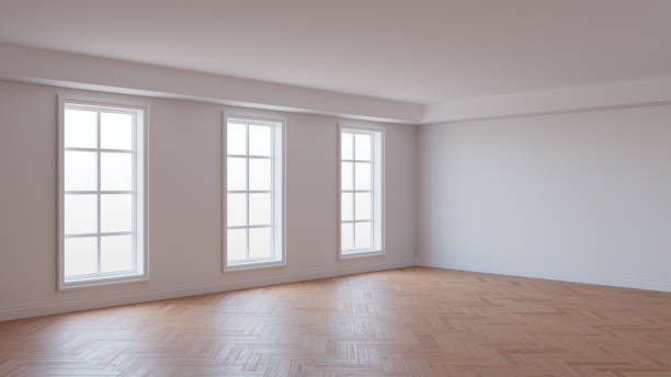 istock Empty Interior of the Room with White Stucco Walls, Three Large Windows 1529338001