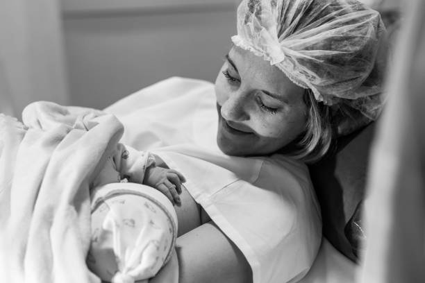 istock Mother breastfeeding her son for the first time 1529340588