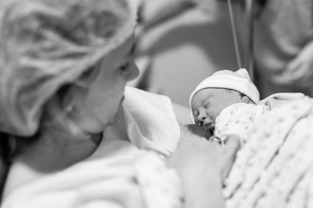 istock Mother breastfeeding her son for the first time 1529342169