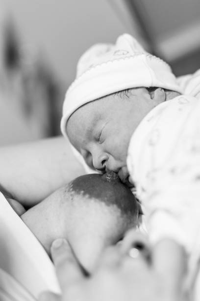 istock Mother breastfeeding her son for the first time 1529342586
