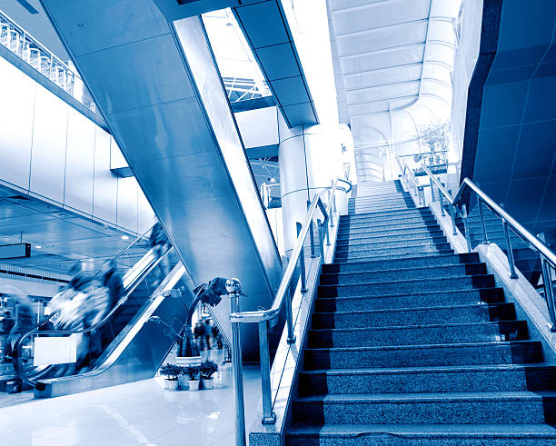 istock People at the airport escalator 152938538