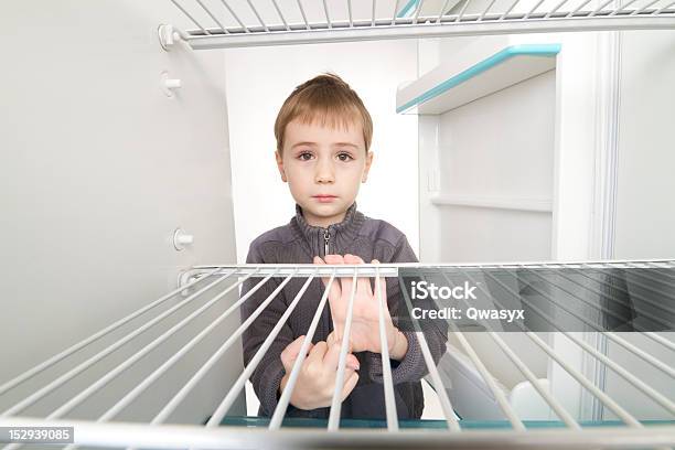 Boy And Empty Refrigerator Stock Photo - Download Image Now - Hungry, Child, Refrigerator