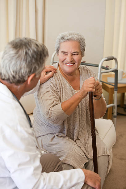 istock Senior doctor talking with his patient 152939635