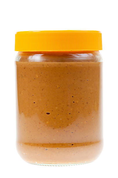 istock Jar of peanut butter isolated 152939738