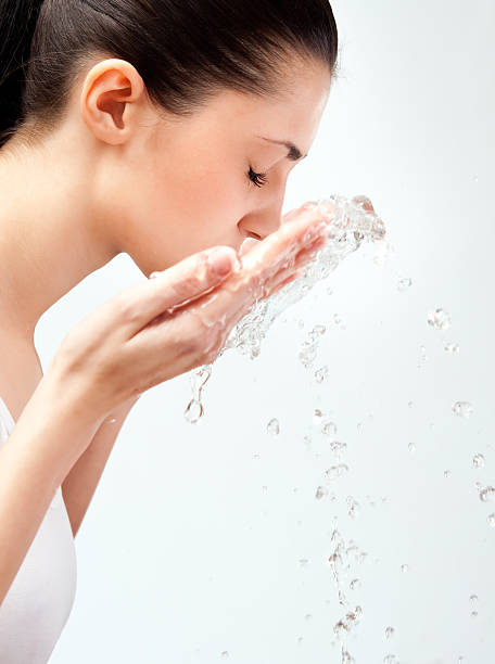 istock woman wash her face 152941220