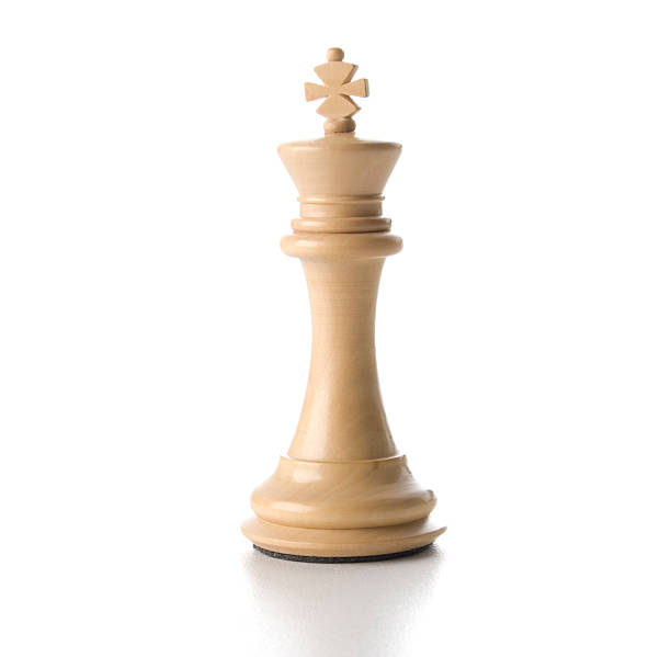 White chess queen on pink