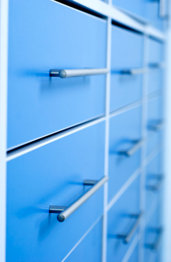 Multiple rows of filing cabinets