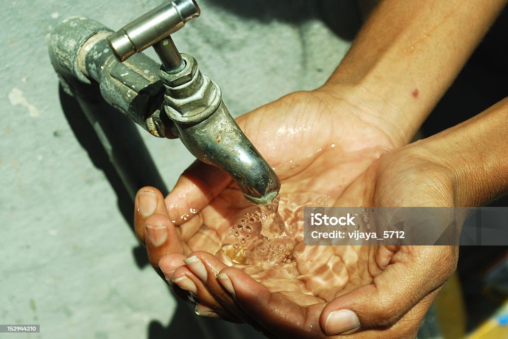 Thirsty Tap Water Catching Stock Photo