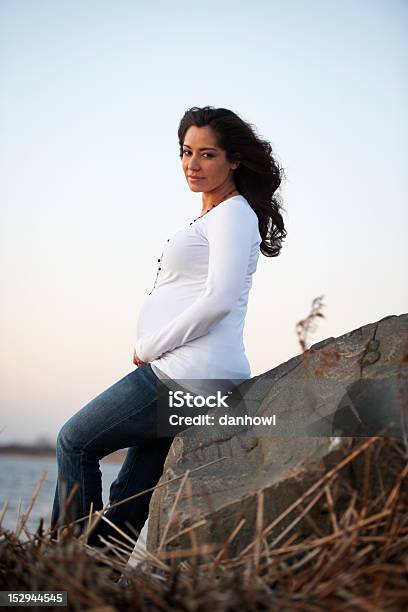 Expecting Mother Sitting Outside Stock Photo - Download Image Now - Abdomen, Adult, Adults Only