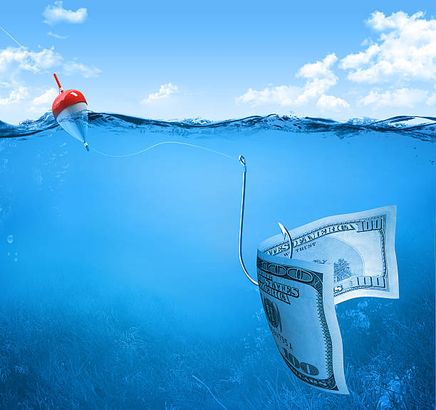 istock fishing with money 152944682