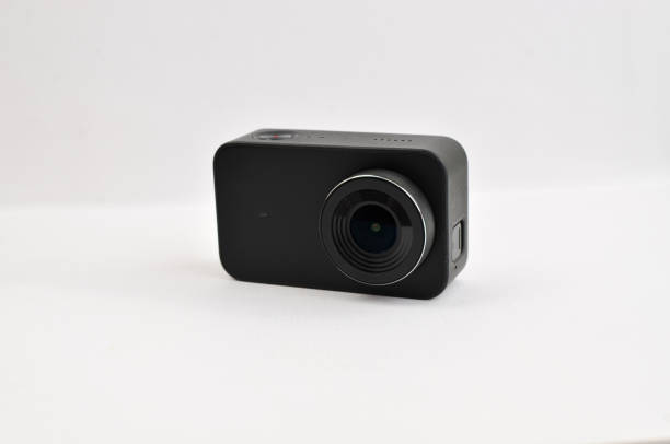 istock A small black 4K action camera on a table, ready to capture thrilling adventures in high resolution. 1529448847