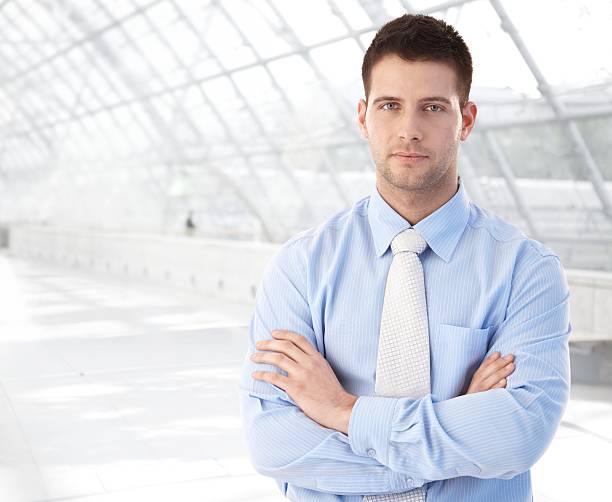 istock Confident businessman standing at modern passage 152945303