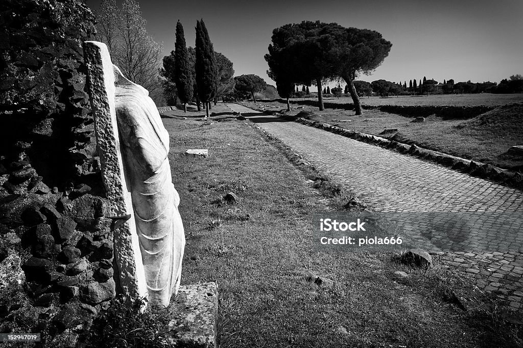 The Appian way in Black and White The Appian Way (Latin and Italian: Via Appia) was one of the earliest and strategically most important Roman roads of the ancient republic. It connected Rome to Brindisi, Apulia, in southeast Italy. The old Appian Way close to Rome is now a free tourist attraction. Ancient Stock Photo