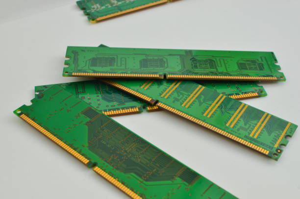 Detail of a computer RAM memory in close-up, with a light background, representing the advanced technology present in modern devices. Detail of a computer RAM memory in close-up, with a light background, representing the advanced technology present in modern devices. motherboard ram slots stock pictures, royalty-free photos & images