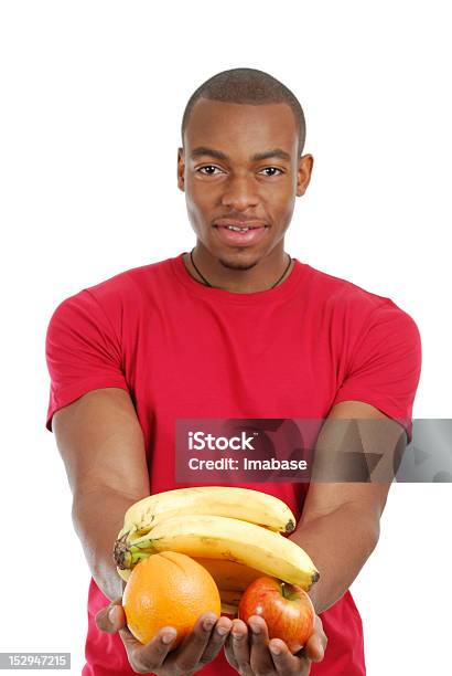 アフリカ系アメリカ人男性の保持フルーツ - Tシャツのストックフォトや画像を多数ご用意 - Tシャツ, アフリカ民族, アフリカ系アメリカ人