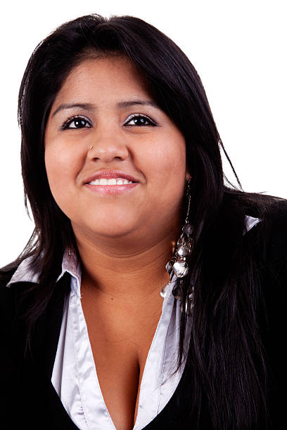 happy and casually dressed large  latin woman stock photo