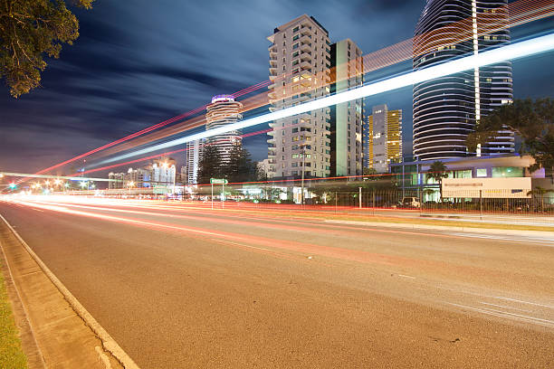 istock light trails over modern city at night 152948130
