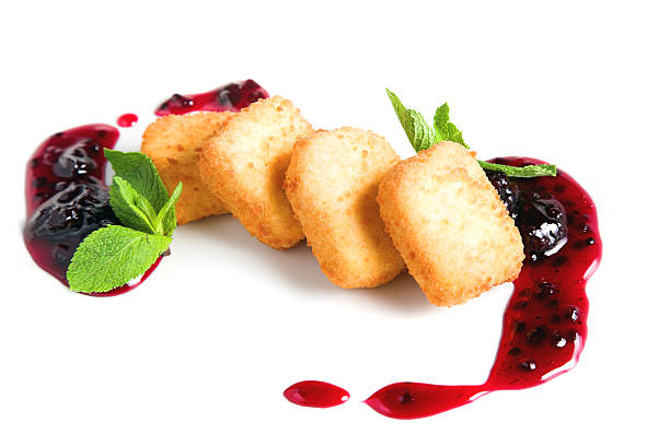 Fruit cheese with blackberry sauce stock photo