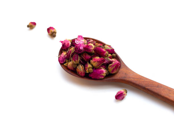 istock Dried roses for tea on white background. 1529492345