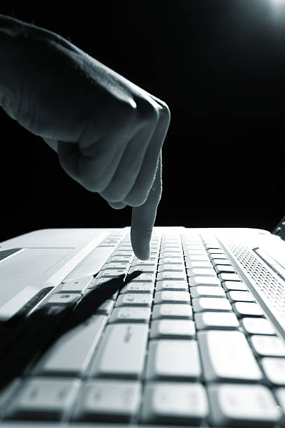 istock male hands typing on a laptop 152950174