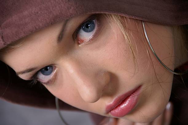 A close up of a young woman's face.