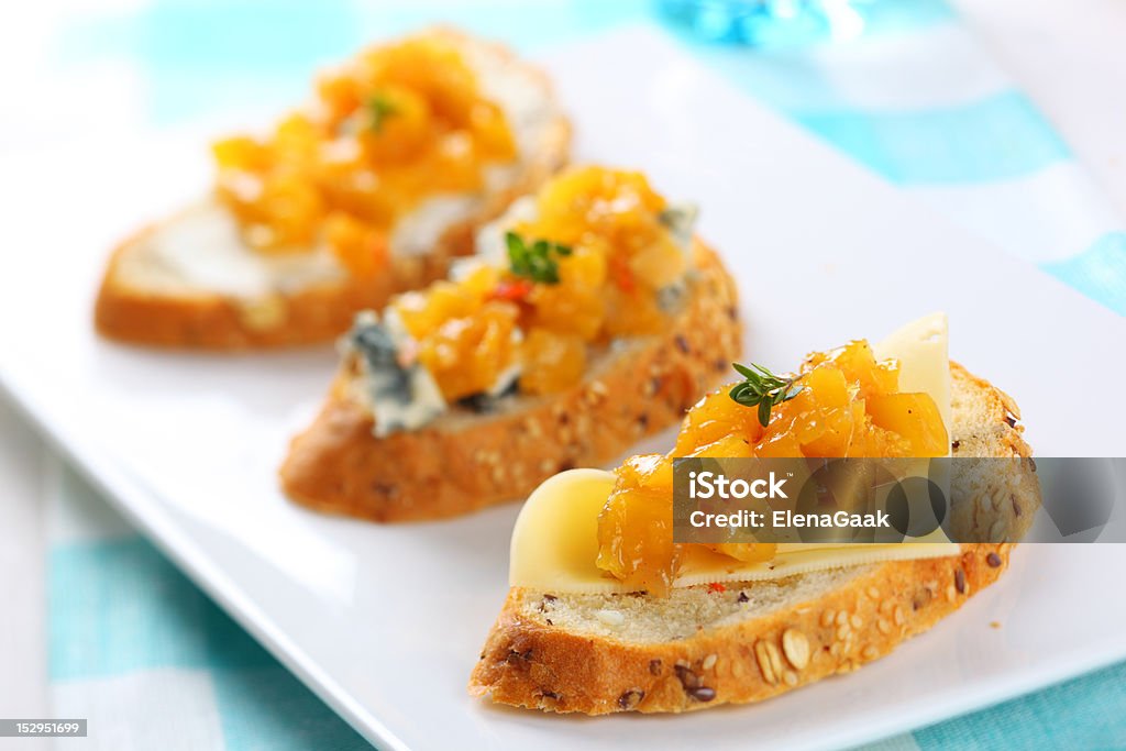 sandwich with blue cheese and mango chutney, soft focus sandwich with variety of cheese and mango chutney, soft focus Blue Cheese Stock Photo