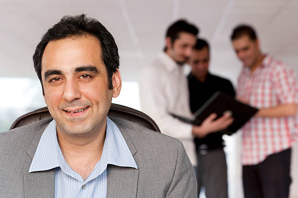 group of young businessmen stock photo