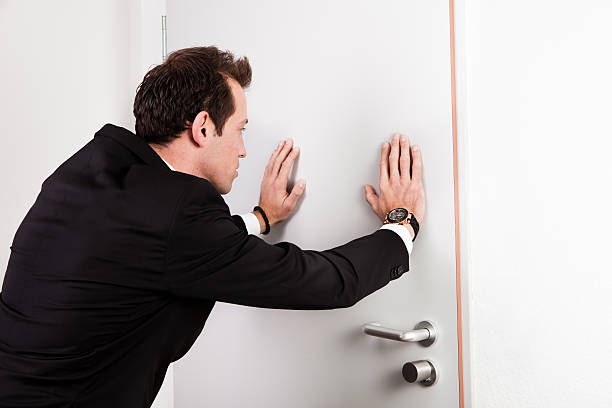istock Businessman pushing the door 152953184