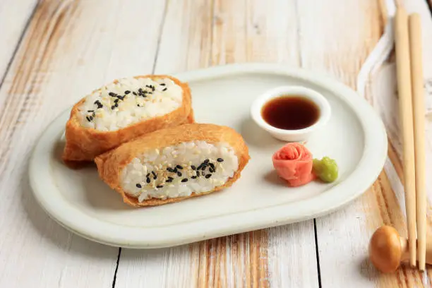 Inari Sushi, RIce with Marinated Tofu Pocket, Topped with Sesame Seed. Japanese Food