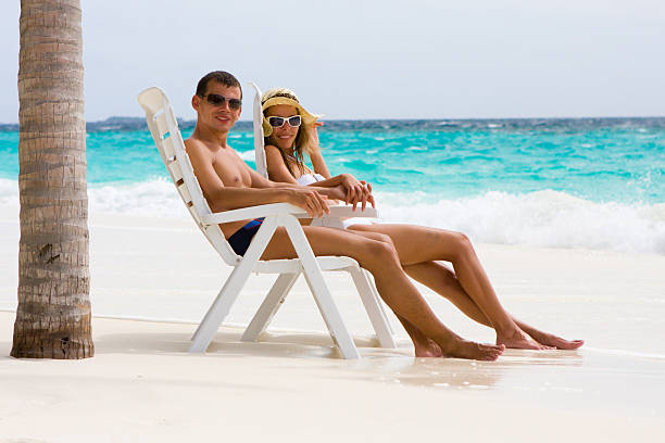 istock Young couple on a tropical beach 152953533