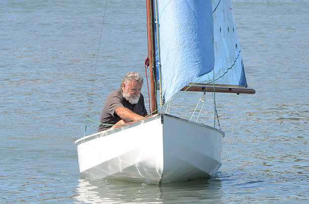 istock Senior in a sailboat 152953603