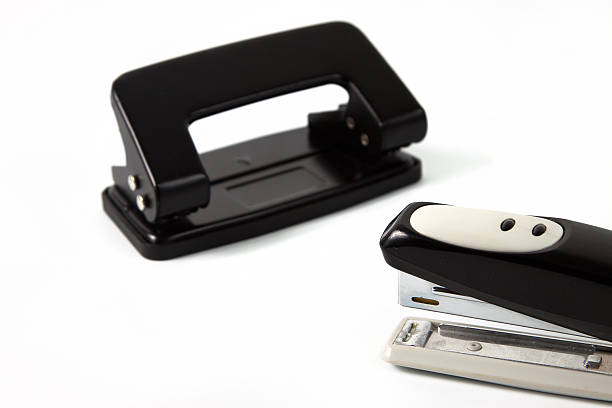 istock office hole punch and staplers 152953758