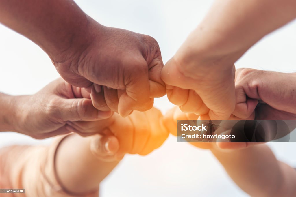 Close up hands Teamwork group of multi racial people meeting join hands. Diversity people hands join empower partnership teams connect volunteer community. Diverse multiethnic Partners team together Honesty Stock Photo