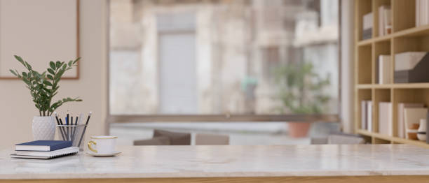 istock Close-up image of a luxury white marble tabletop with empty space in a modern room. 1529552425