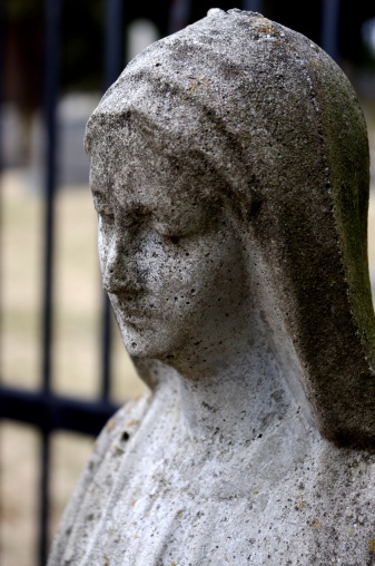 Closeup image of a female statue.