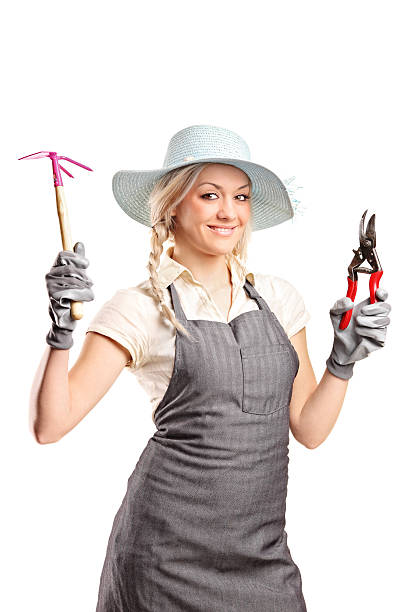 istock Young female gardener with a gardening tools 152957067