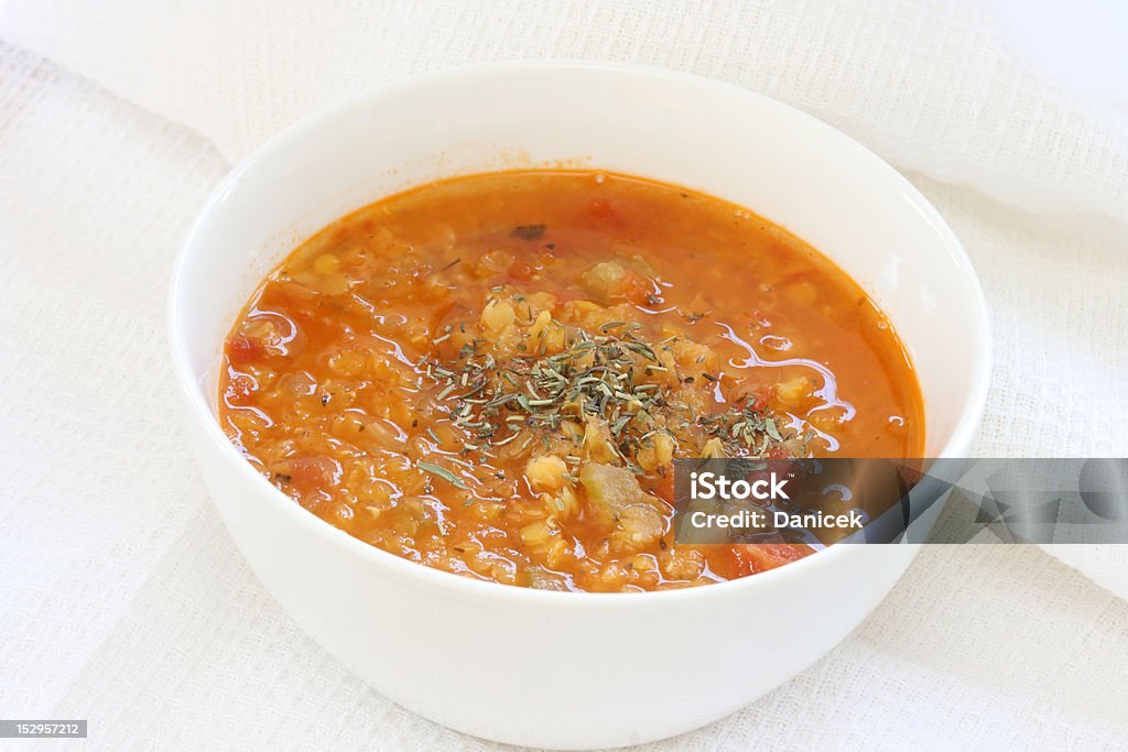Red lentil soup View of red lentil soup in white bowl, Bowl Stock Photo