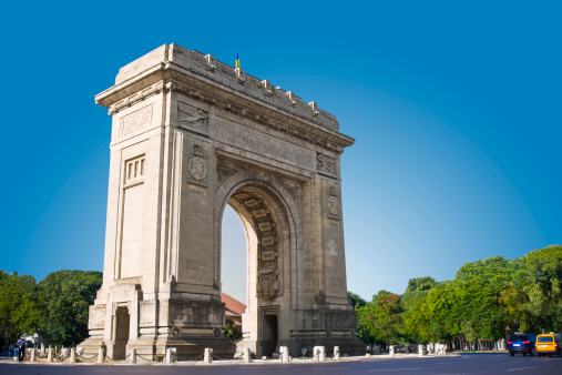 Initially built of wood in 1922 to honor the bravery of Romanian soldiers who fought in World War I, Bucharest's Arc de Triomphe was finished in Deva granite in 1936. Designed by the architect, Petre Antonescu.