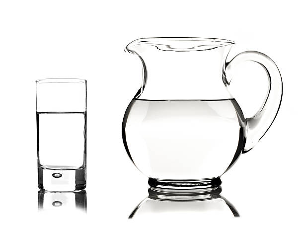 istock Glass and pitcher with water 152957922