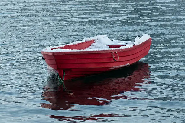 red boat in a Norwegian fjord