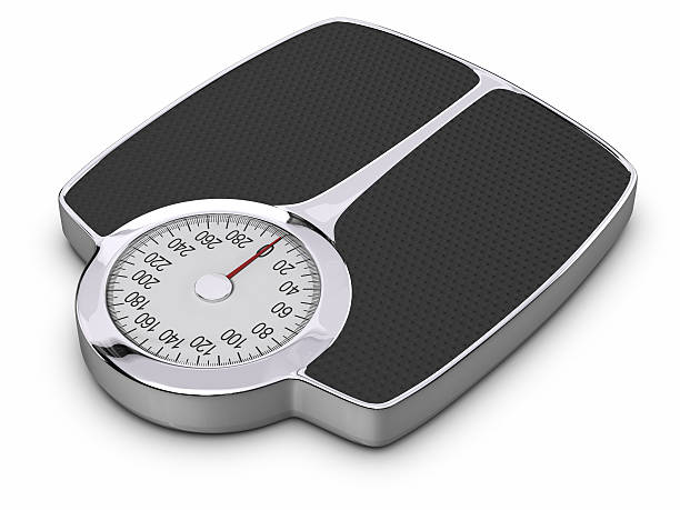 istock Black and silver traditional scale over a white background 152958925