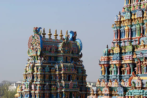 Meenakshi hindu temple in Madurai, Tamil Nadu, South India Meenakshi hindu temple in Madurai, Tamil Nadu, South India. Sculptures on Hindu temple gopura (tower). It is a twin temple, one of which is dedicated to Meenakshi, and the other to Lord Sundareswarar menakshi stock pictures, royalty-free photos & images