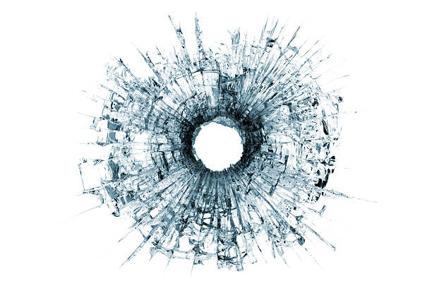 buraco de bala em vidro isolado no branco - bullet hole hole glass destruction - fotografias e filmes do acervo