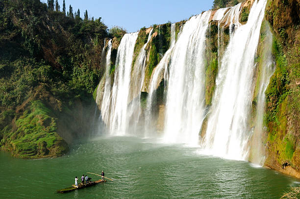 istock Some people play nearby the waterfall 152959395