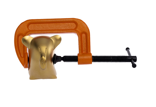 Orange clamp with a piggy bank.