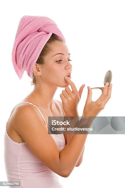 Beautiful Girl Looking In A Hand Mirror Stock Photo - Download Image Now - Examining, Hand Mirror, 16-17 Years