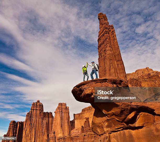 Hikers On The Summit Stock Photo - Download Image Now - Achievement, Adventure, At The Edge Of