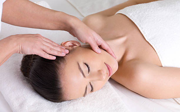 istock Girl having massage for her head 152964883